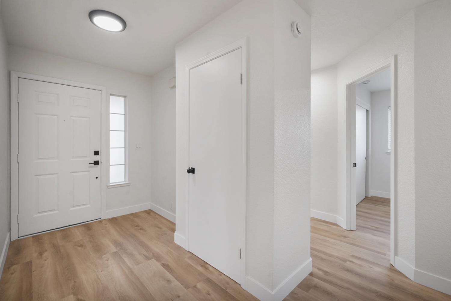 1128 Raymond Drive Modesto, CA 95351 - Photo 15 of 32 wooden floor in an empty room