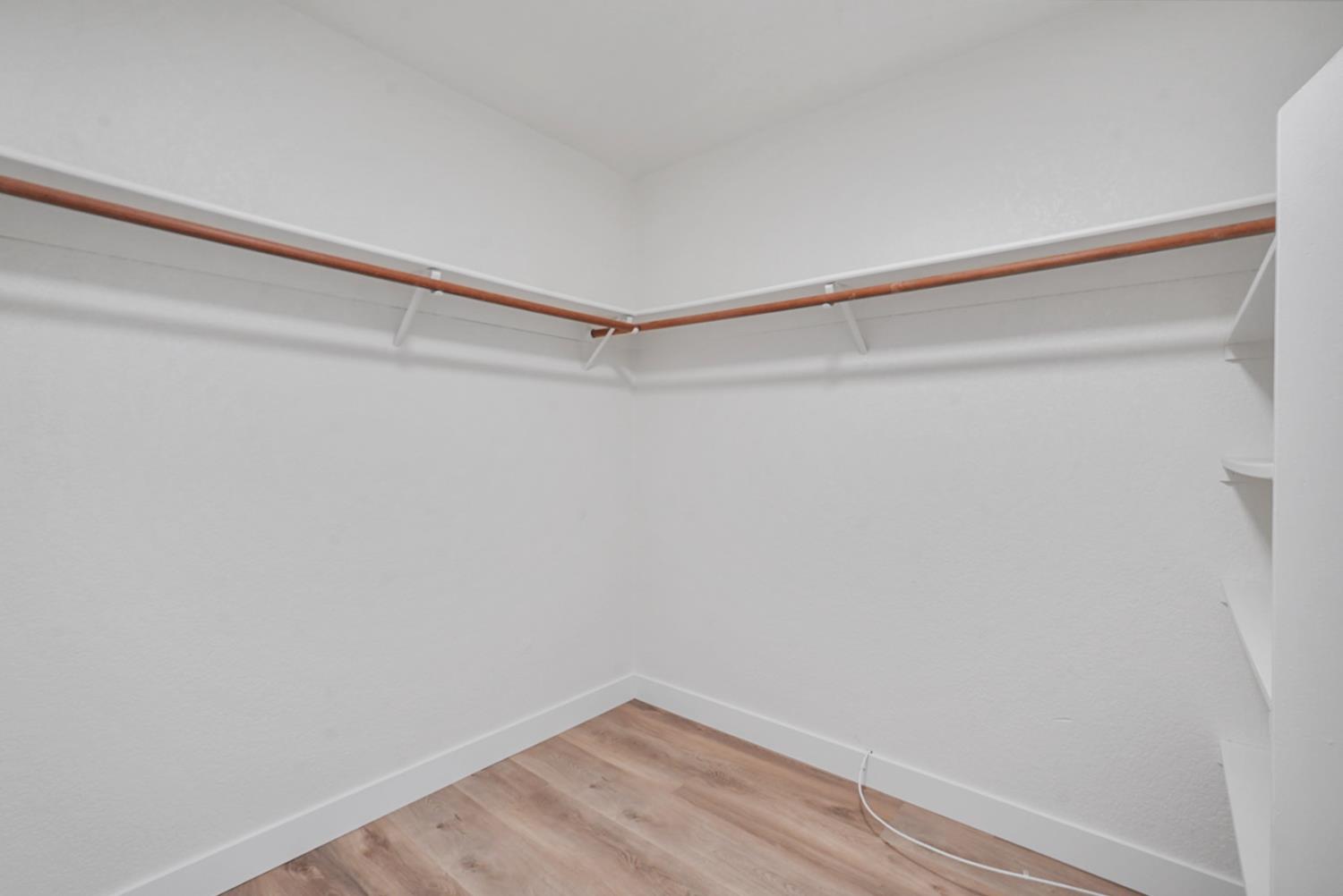 1128 Raymond Drive Modesto, CA 95351 - Photo 23 of 32 a view of a room with shelf on the wall