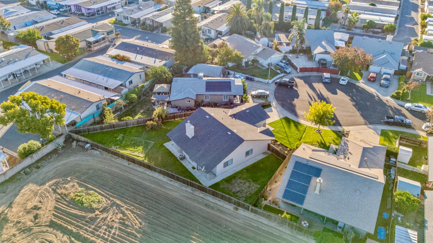 1128 Raymond Drive Modesto, CA 95351 - Photo 30 of 32 an aerial view of a house with a swimming pool