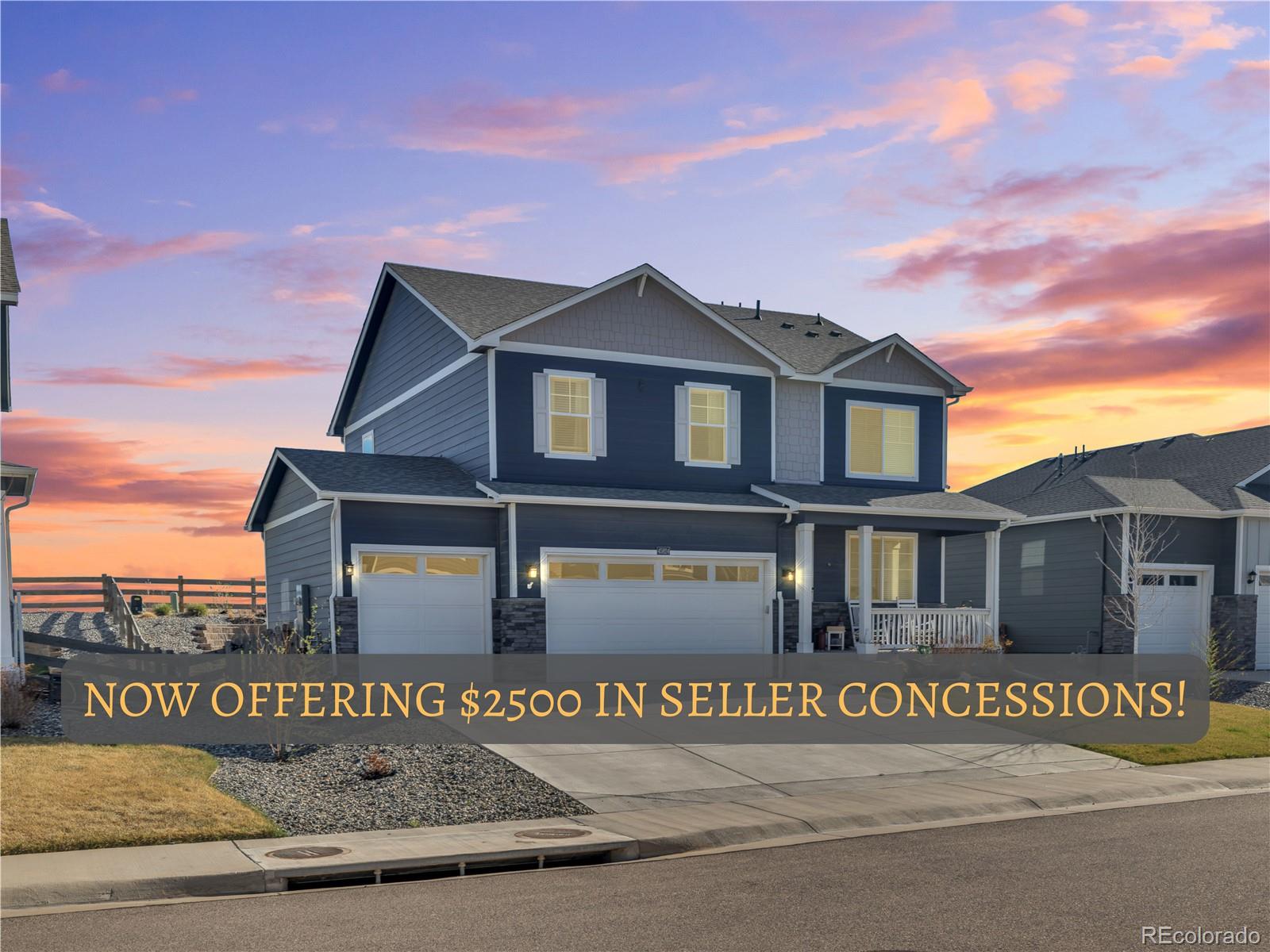 45824 Silverdrop Avenue Bennett, CO 80102 - Photo 1 of 49 a view of a house with a street
