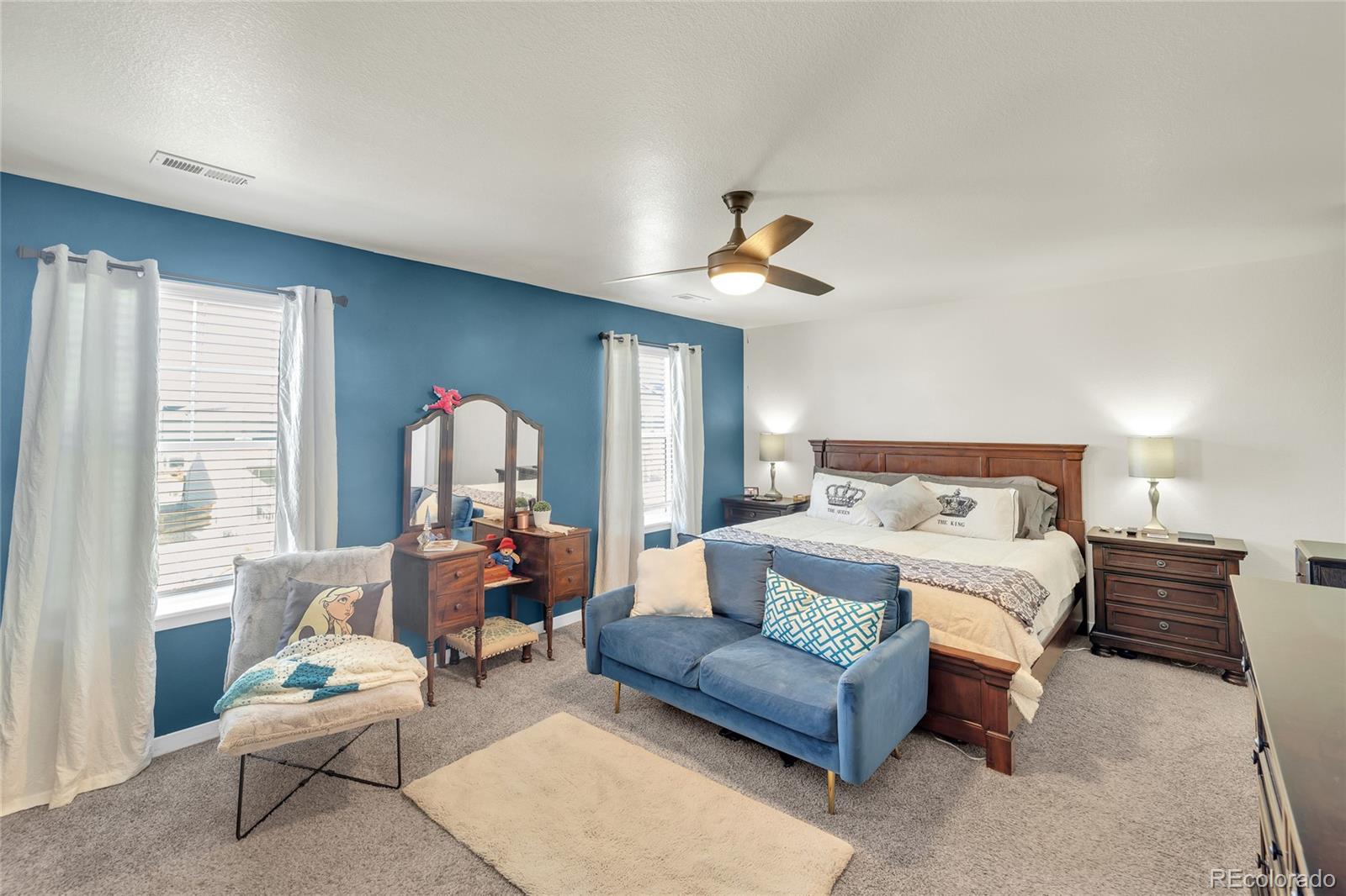 45824 Silverdrop Avenue Bennett, CO 80102 - Photo 29 of 49 a bedroom with furniture and a large window