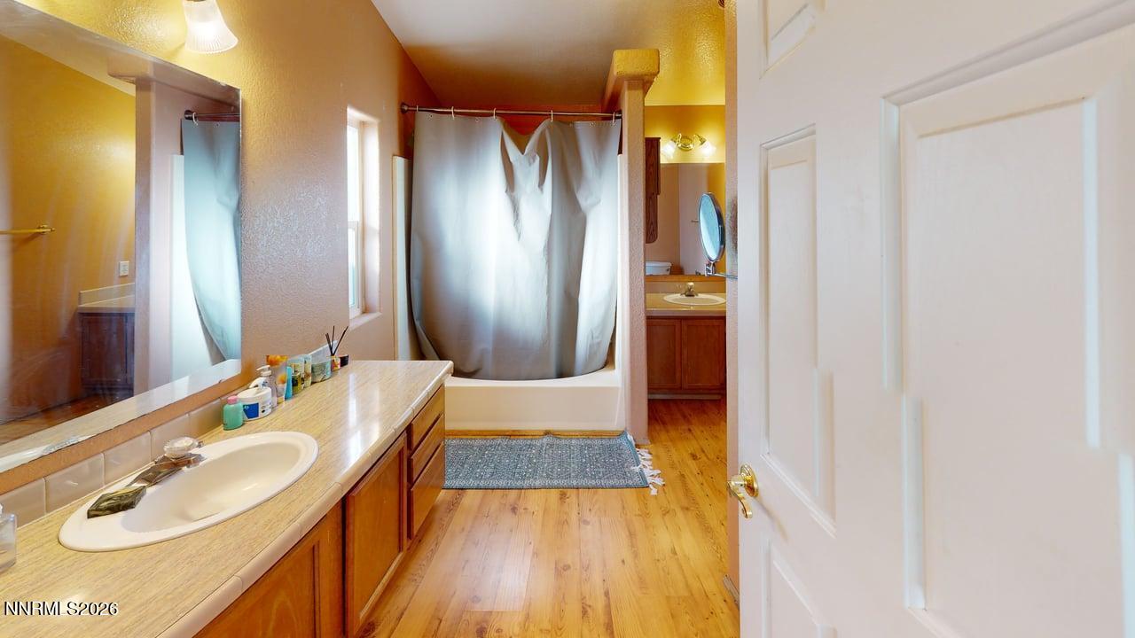 7430 West Rose Creek Road Winnemucca, NV 89445 - Photo 15 of 24 7430-W-Rose-Creek-Rd-Bathroom 1