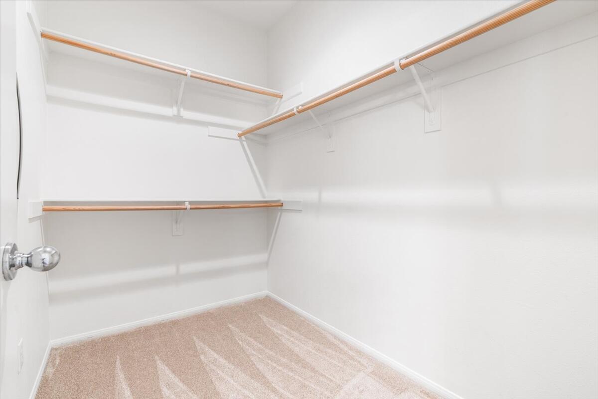 82732 Castleton Drive Indio, CA 92203 - Photo 17 of 45 a view of an empty walk in closet