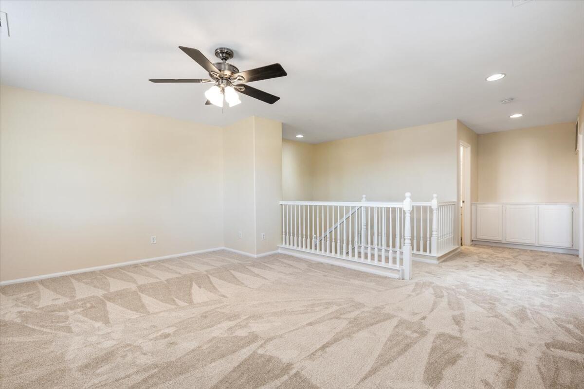 82732 Castleton Drive Indio, CA 92203 - Photo 23 of 45 a view of empty room with wooden floor