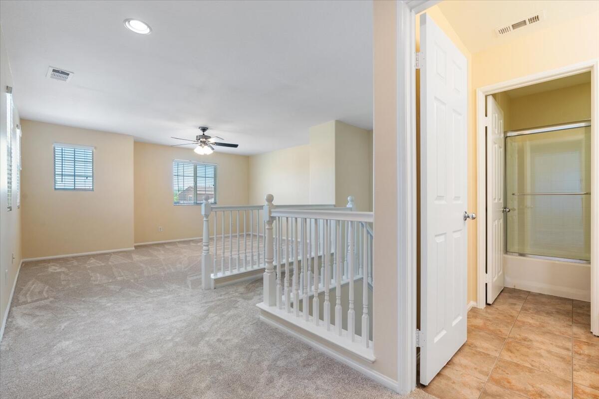 82732 Castleton Drive Indio, CA 92203 - Photo 25 of 45 a view of a hallway with windows and entryway