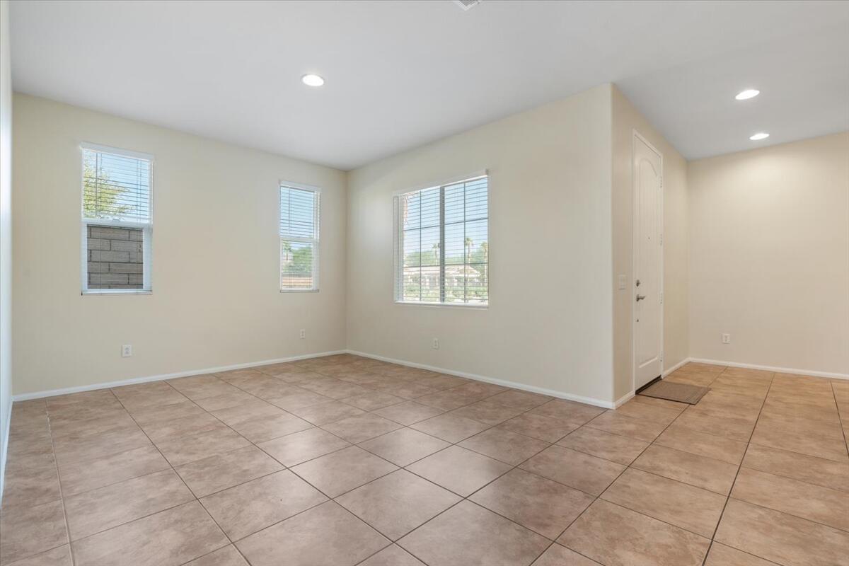 82732 Castleton Drive Indio, CA 92203 - Photo 3 of 45 an empty room with windows