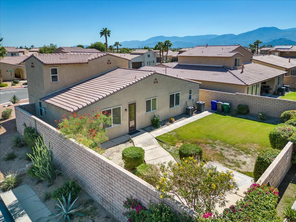 82732 Castleton Drive Indio, CA 92203 - Photo 35 of 45 an aerial view of residential houses with yard