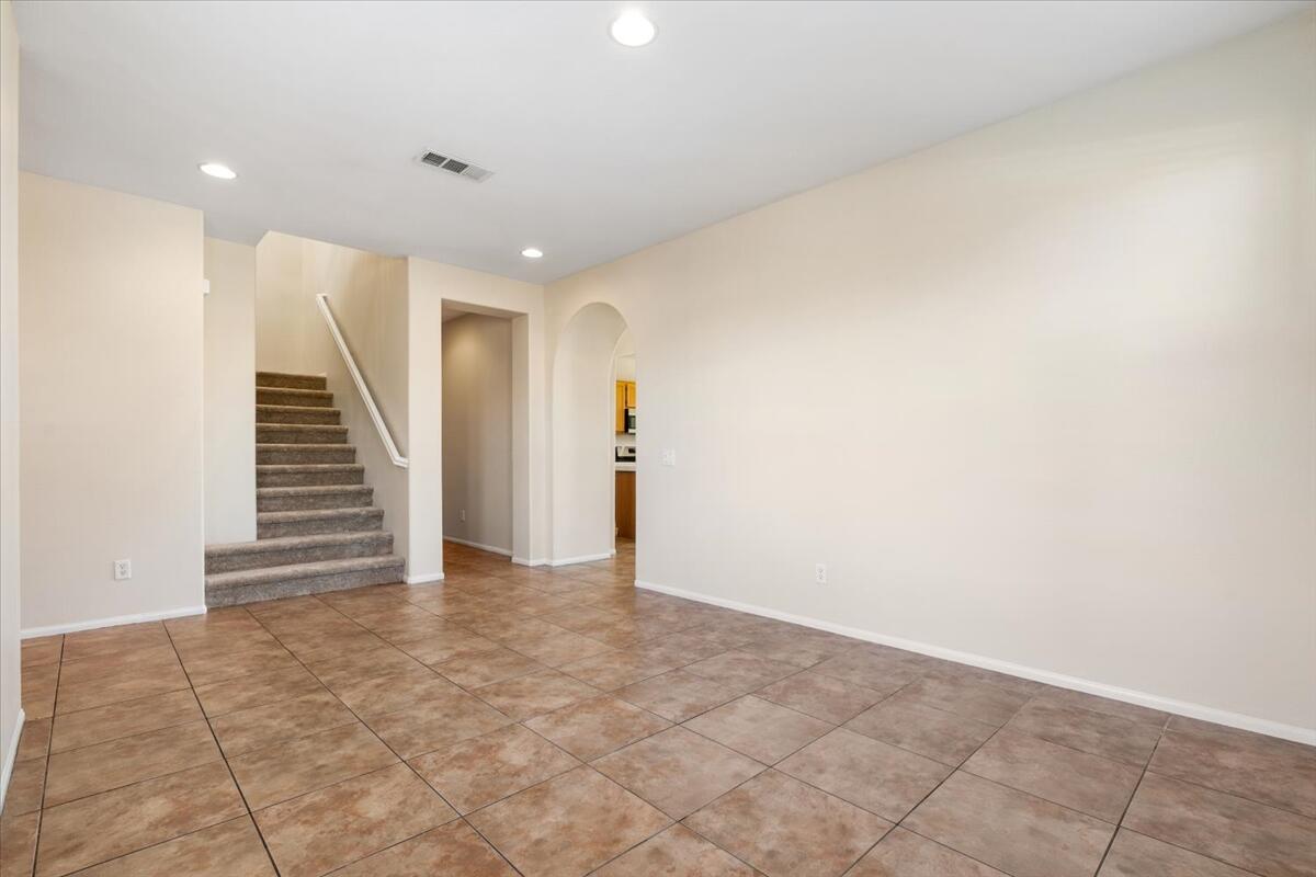 82732 Castleton Drive Indio, CA 92203 - Photo 4 of 45 a view of an empty room with stairs