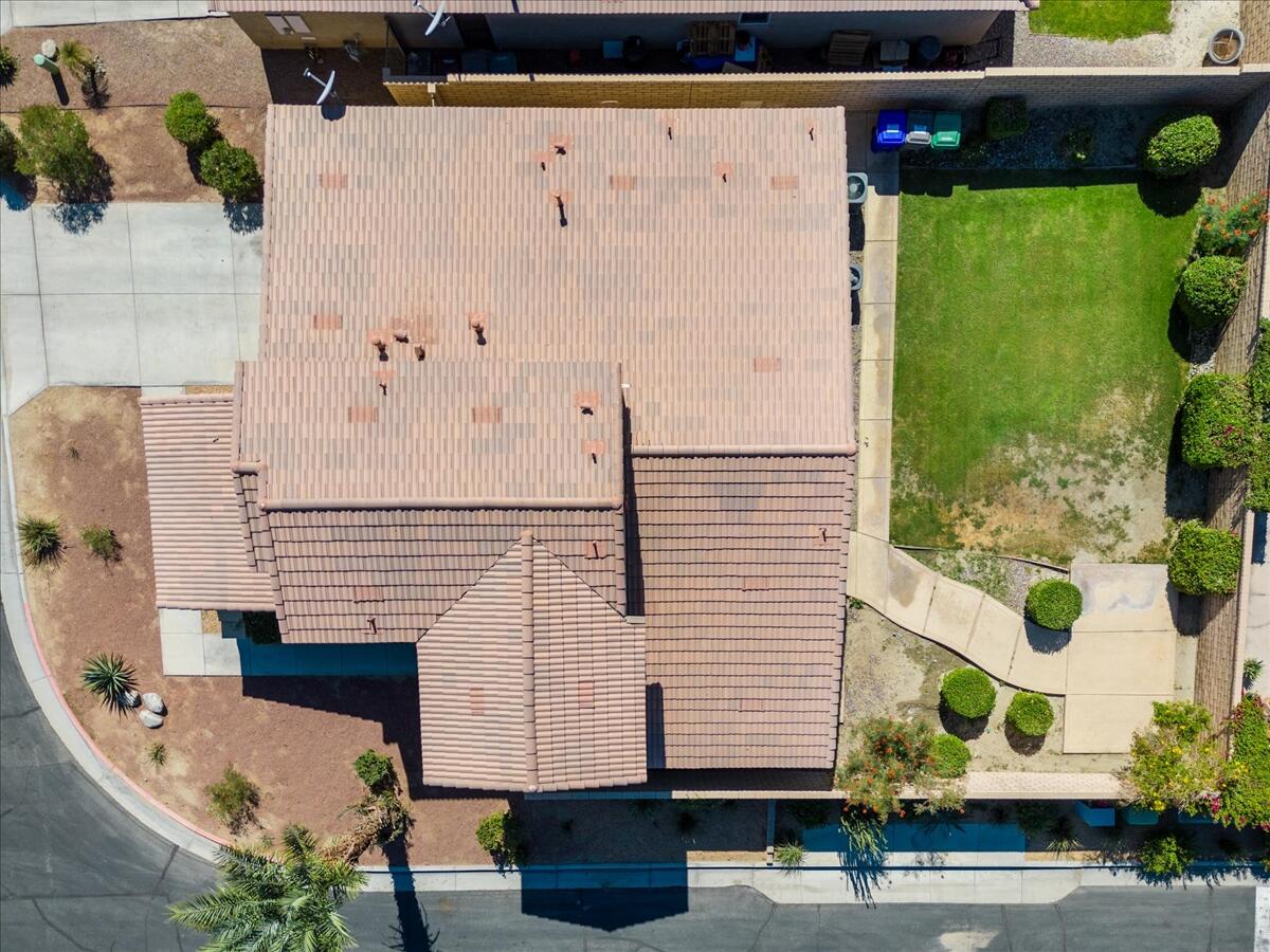 82732 Castleton Drive Indio, CA 92203 - Photo 44 of 45 an aerial view of a house with a yard and potted plants