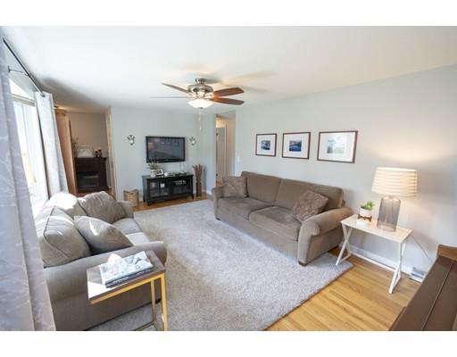 14 Rachel Street Springfield, MA 01129 - Photo 6 of 25 a living room with furniture and a flat screen tv