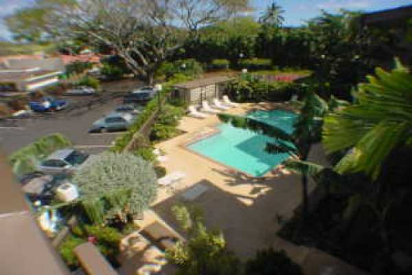 320 Papaloa Road, Unit 305 Kapaa, HI 96746 - Photo 7 of 8 a view of a lake view with a garden