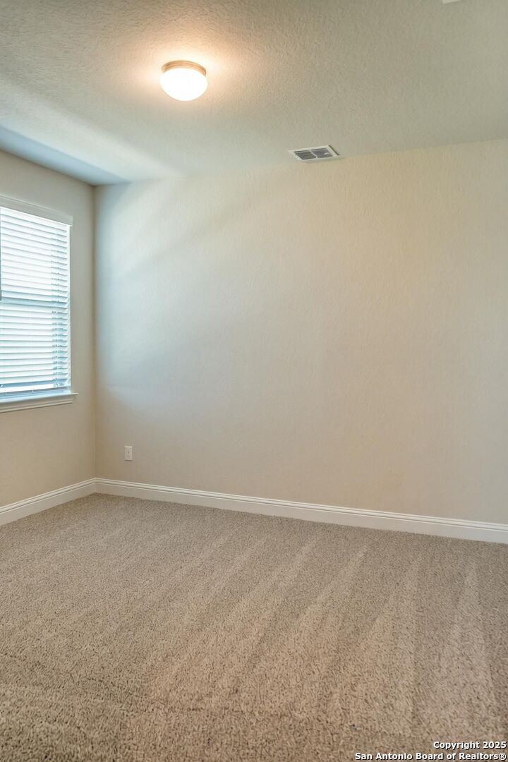 5209 Pinder Way Marion, TX 78124 - Photo 6 of 8 an empty room