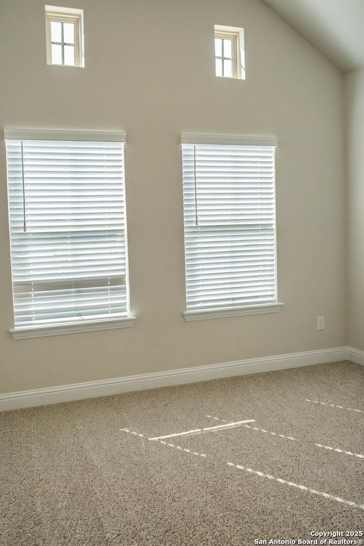 5209 Pinder Way Marion, TX 78124 - Photo 7 of 8 a view of a room that has a window in it