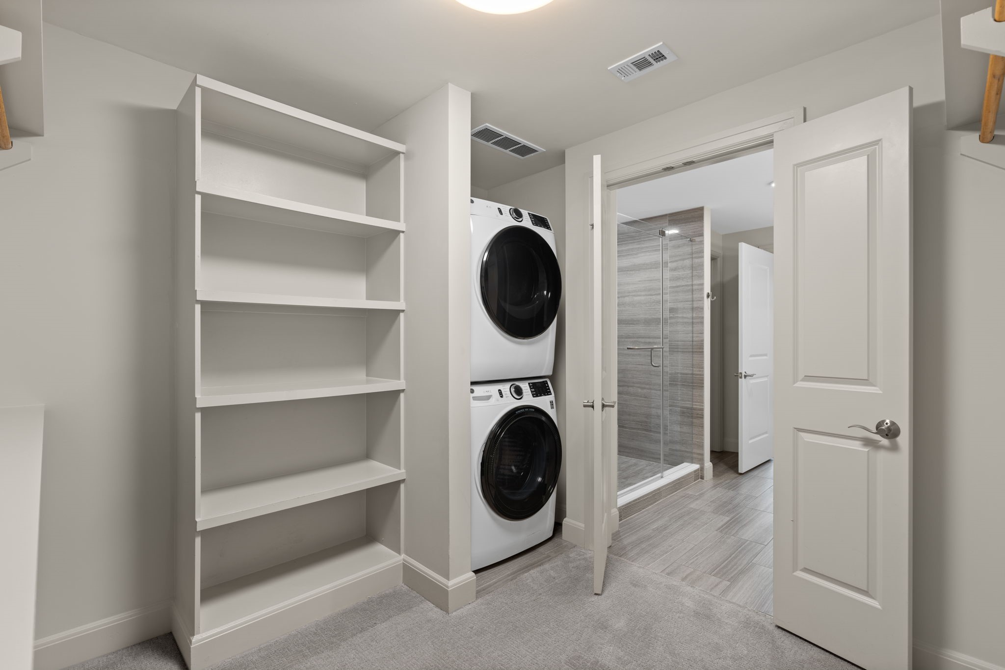 2511 Willowick Road, Unit 551 Houston, TX 77027 - Photo 20 of 45 a utility room with sink dryer and washer