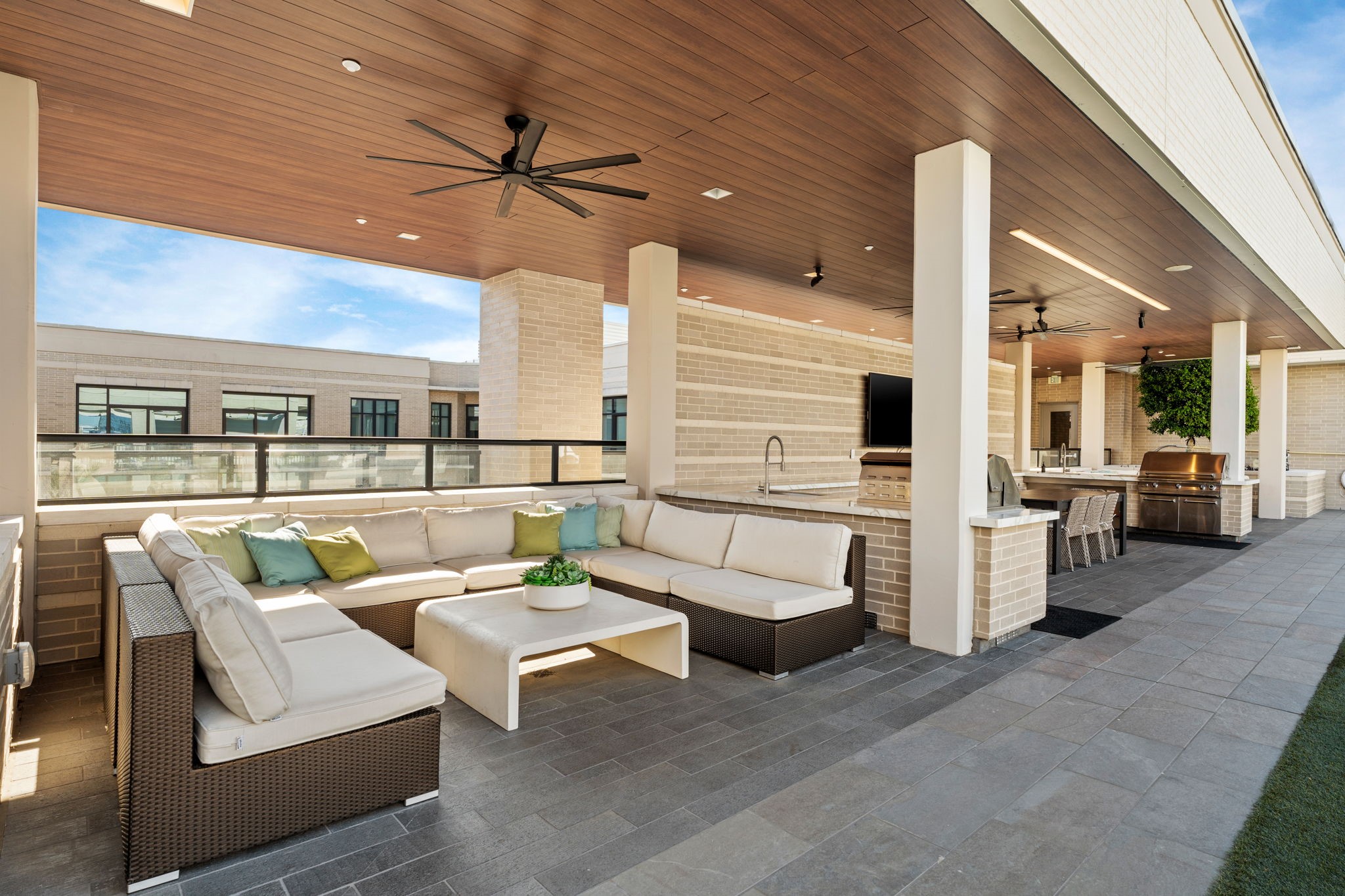 2511 Willowick Road, Unit 551 Houston, TX 77027 - Photo 32 of 45 a patio with patio couch and chairs