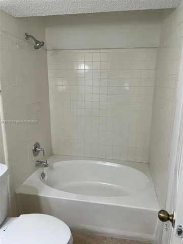 a bathroom with a sink and a bathtub