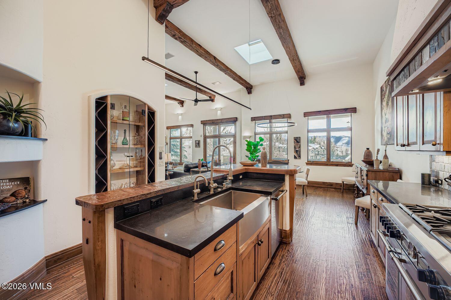 311 Foal Drive Edwards, CO 81632 - Photo 14 of 29 a kitchen with a sink a counter top space and stainless steel appliances