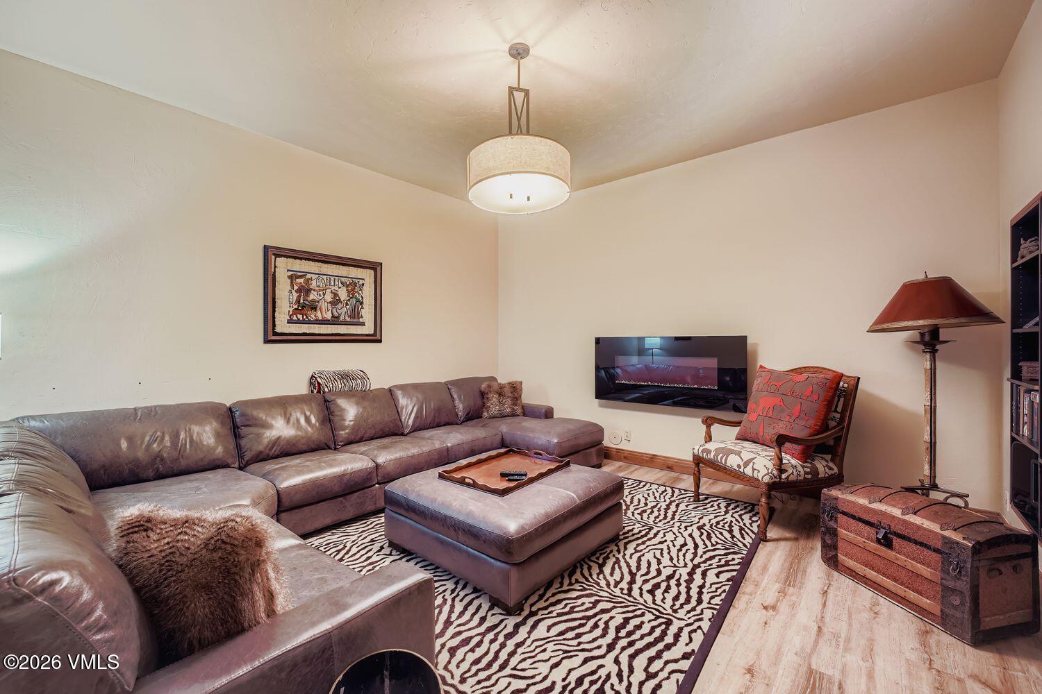 311 Foal Drive Edwards, CO 81632 - Photo 20 of 29 a living room with furniture a flat screen tv and a lamp