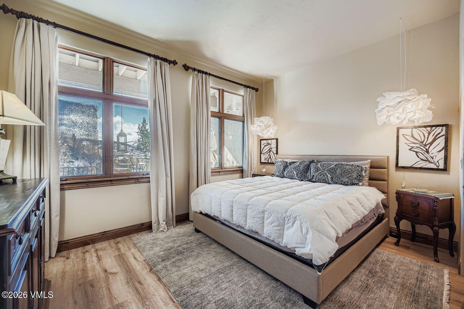 311 Foal Drive Edwards, CO 81632 - Photo 24 of 29 a bedroom with a large bed and a large window