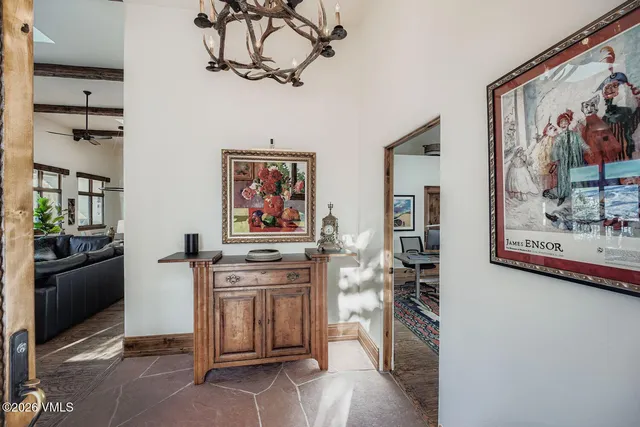 a kitchen with stainless steel appliances granite countertop a stove and a refrigerator