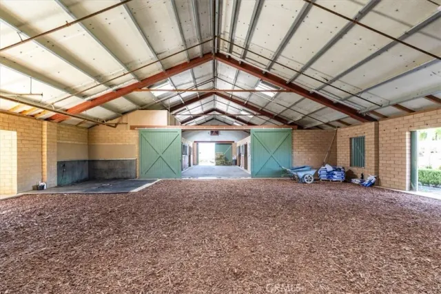 a view of a swimming pool with a yard