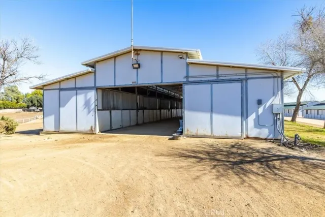 a view of outdoor space with wooden fence
