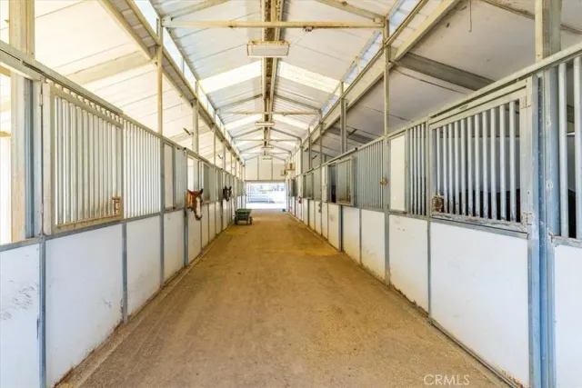 a view of a swimming pool with a lounge chair