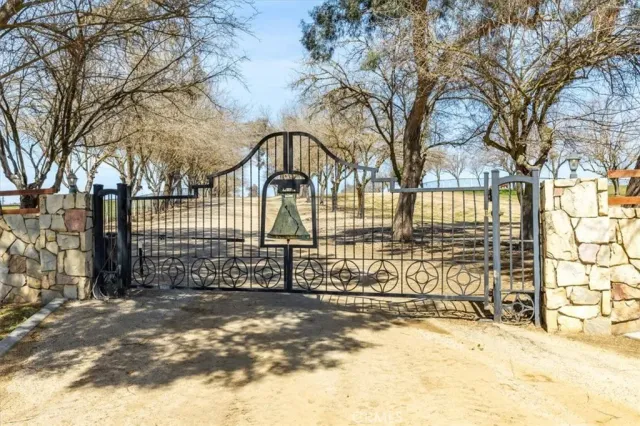 a view of house with outdoor space and sitting area