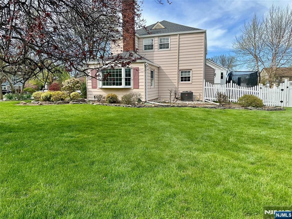 440 Bogert Road River Edge, NJ 07661 - Photo 2 of 25 a view of a yard in front of a house