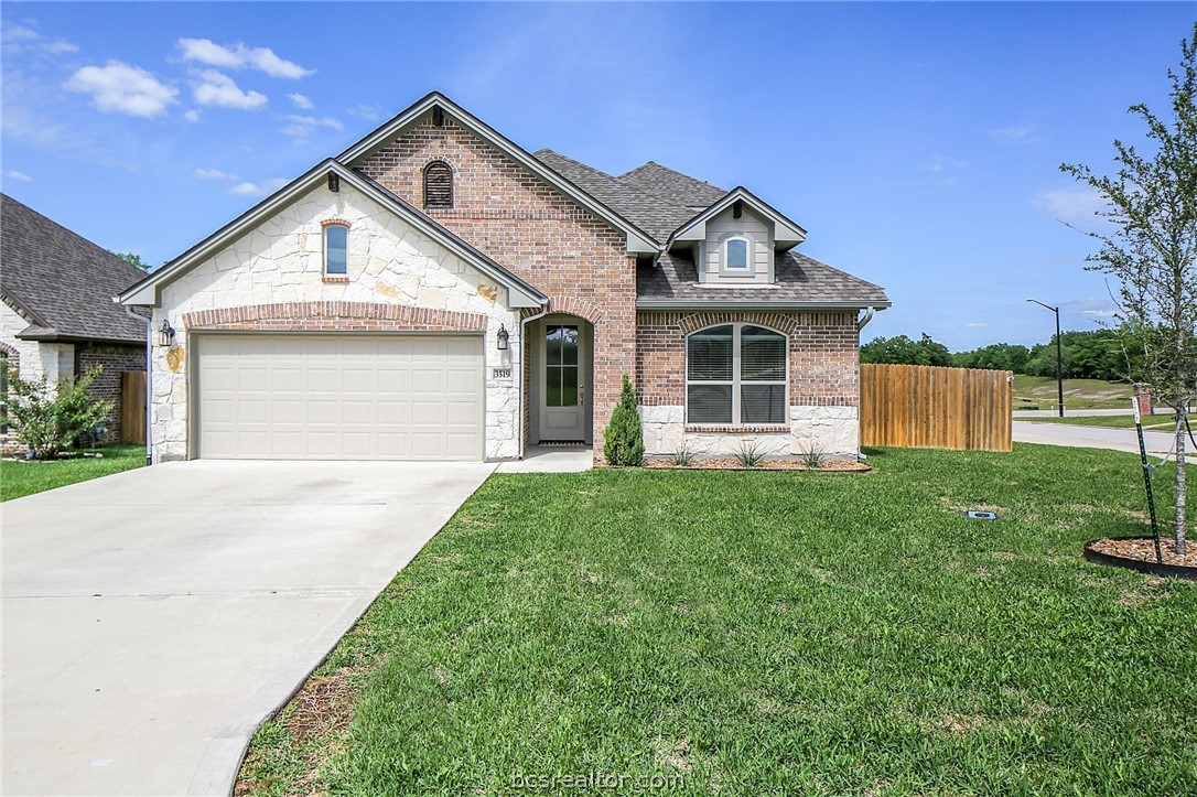 3519 Falston Green Bryan, TX 77808 - Photo 1 of 1 a front view of a house with a yard