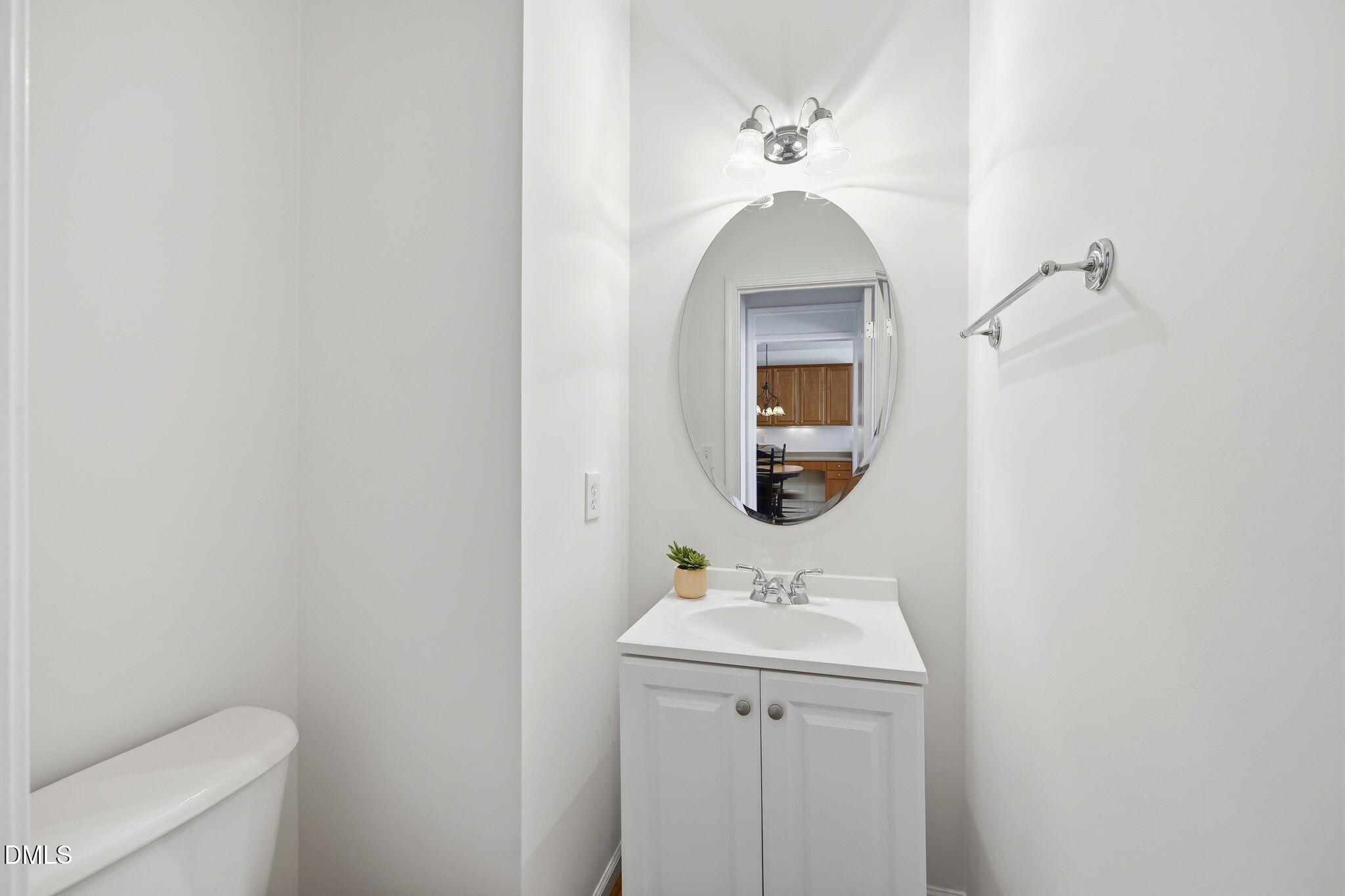 7712 Cloudview Lane Raleigh, NC 27613 - Photo 23 of 40 27-web-or-mls-IMG_4759 Powder room
