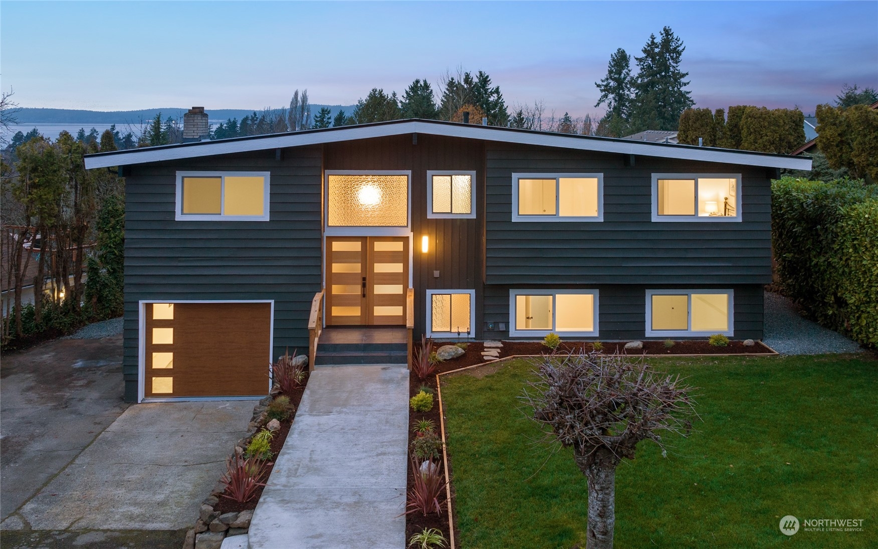 815 Rowell Street Steilacoom, WA 98388 - Photo 1 of 34 a front view of a house with a yard