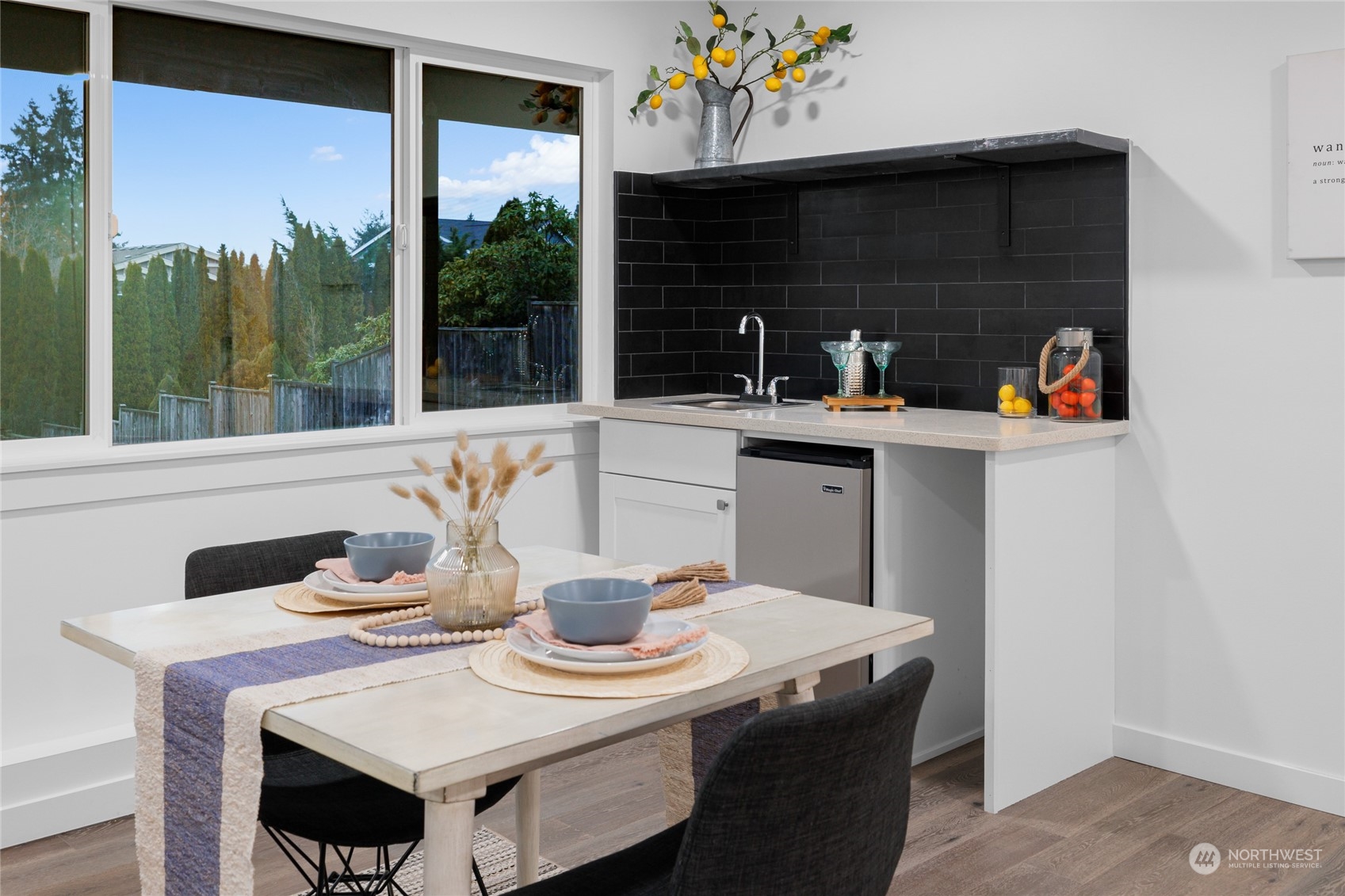 815 Rowell Street Steilacoom, WA 98388 - Photo 11 of 34 a kitchen with a table and chairs