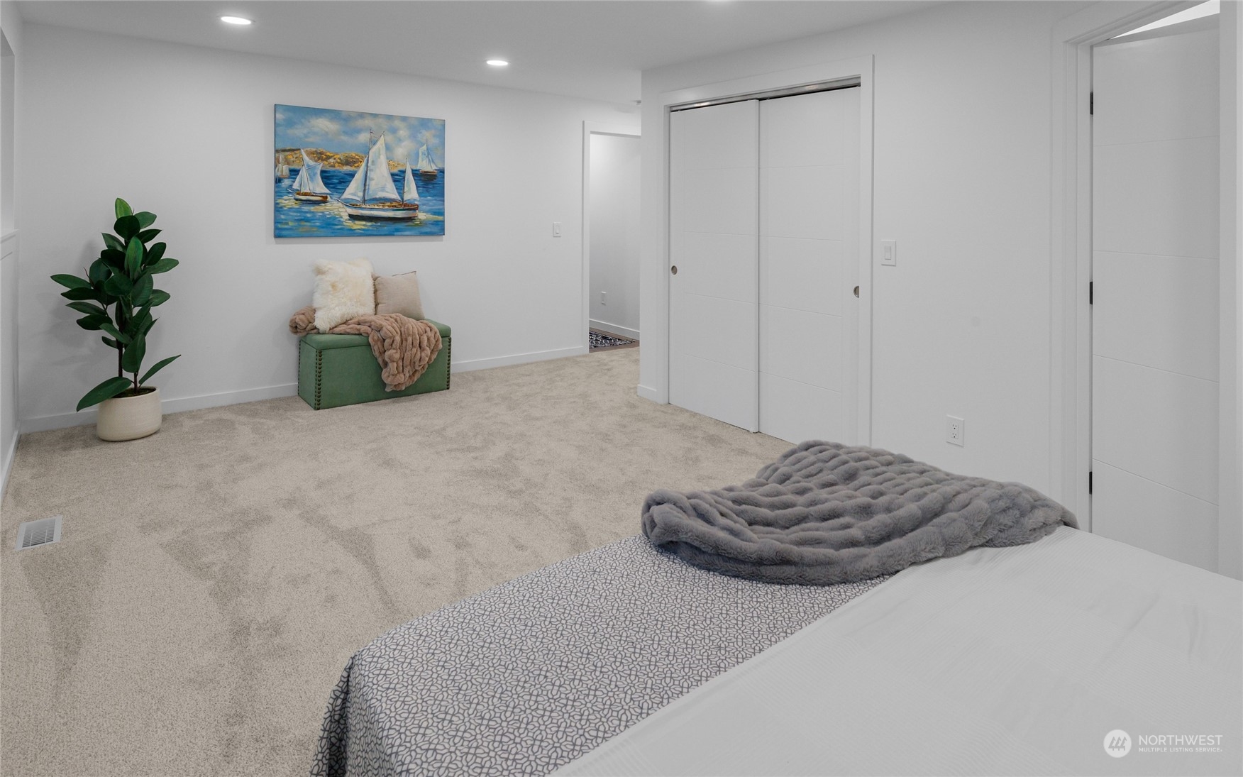 815 Rowell Street Steilacoom, WA 98388 - Photo 13 of 34 a bedroom with a bed and a couch