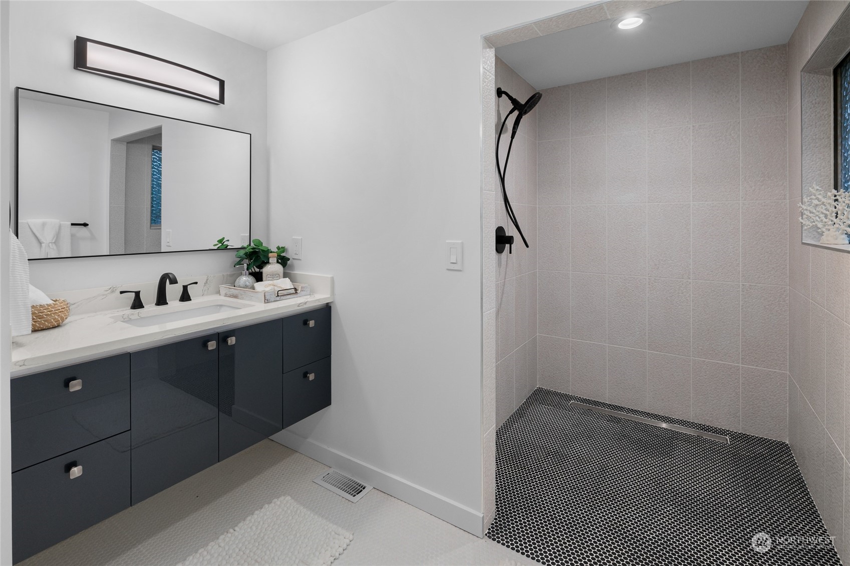815 Rowell Street Steilacoom, WA 98388 - Photo 14 of 34 a bathroom with a sink and a mirror