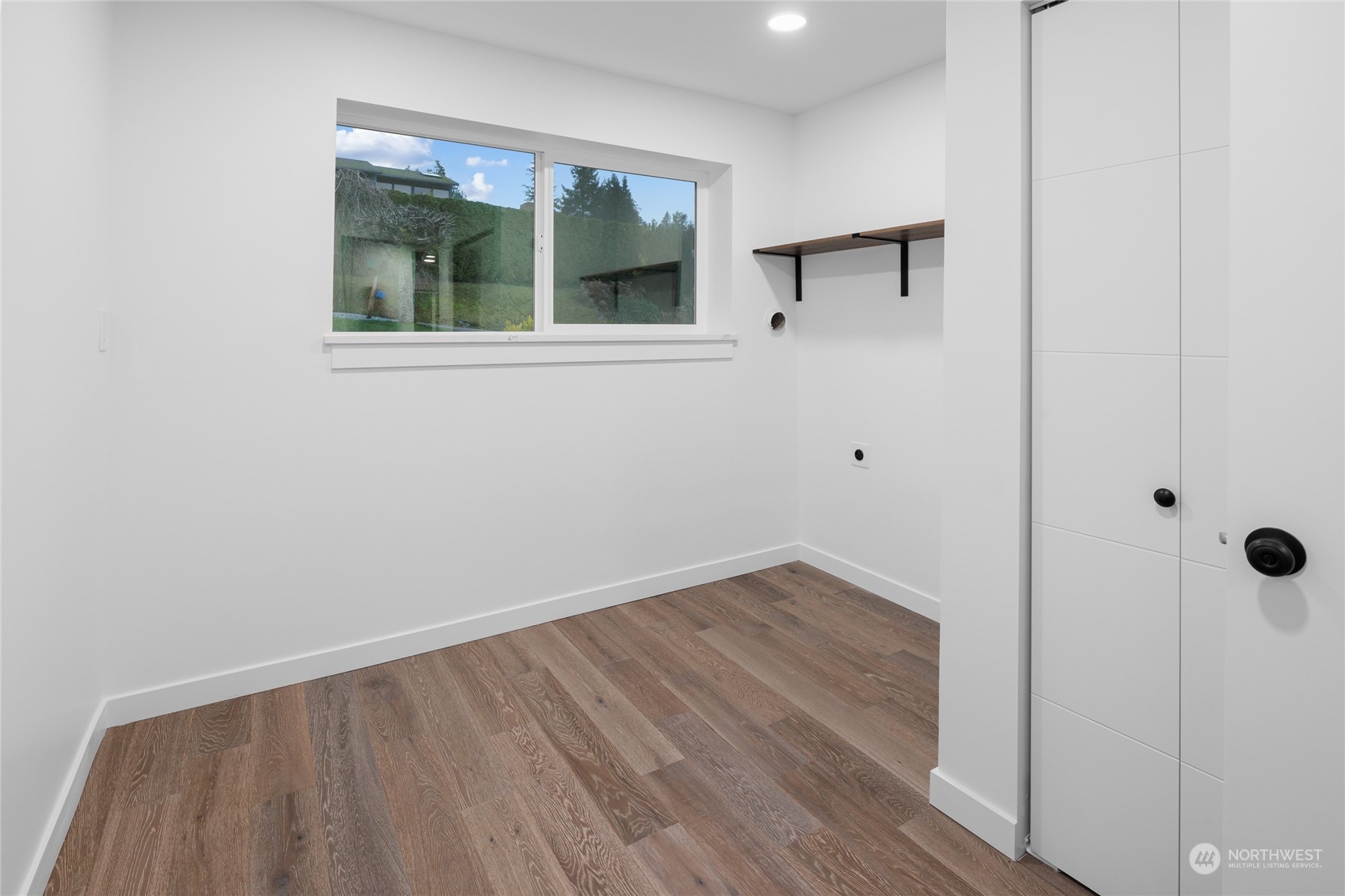 815 Rowell Street Steilacoom, WA 98388 - Photo 19 of 34 wooden floor in an empty room