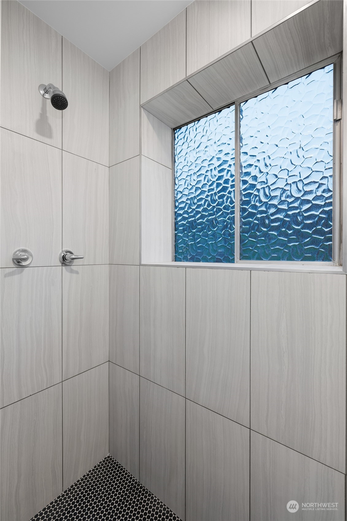 815 Rowell Street Steilacoom, WA 98388 - Photo 22 of 34 a bathroom with a shower