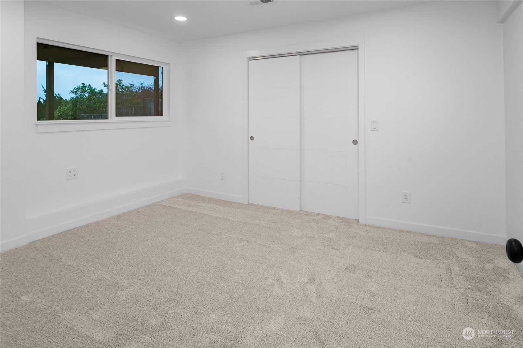815 Rowell Street Steilacoom, WA 98388 - Photo 23 of 34 a view of an empty room with a window
