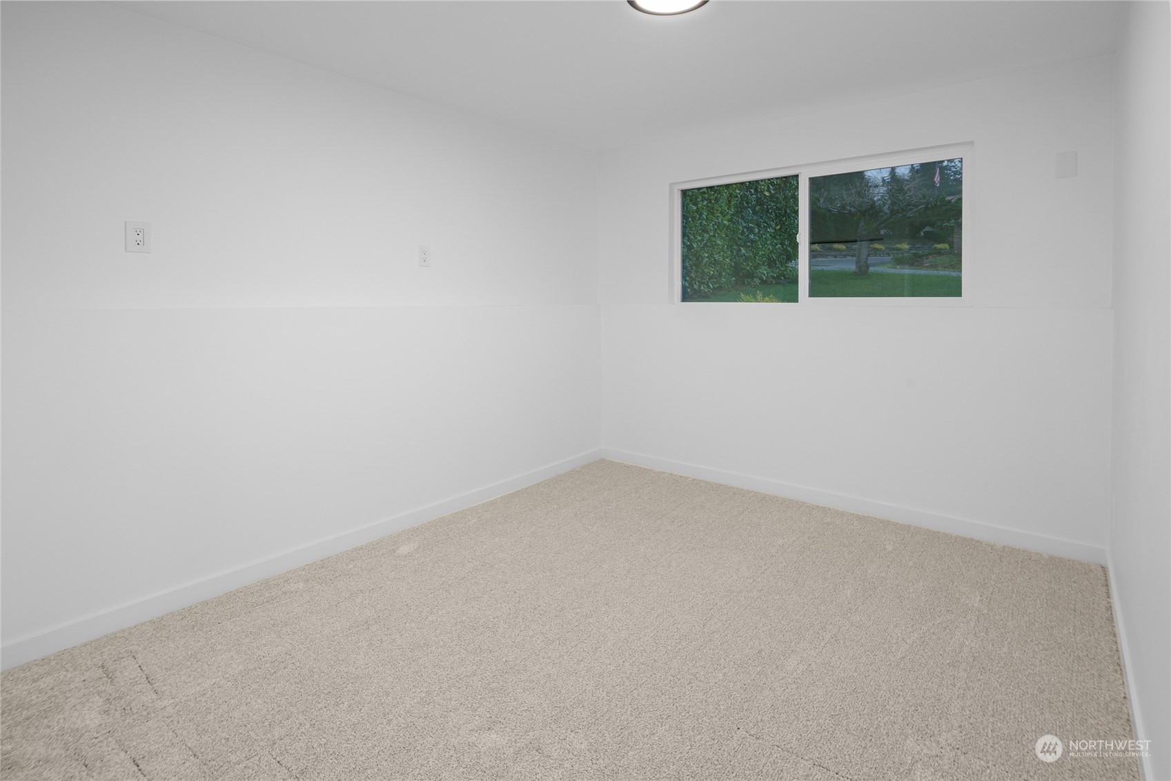 815 Rowell Street Steilacoom, WA 98388 - Photo 24 of 34 an empty room with a window