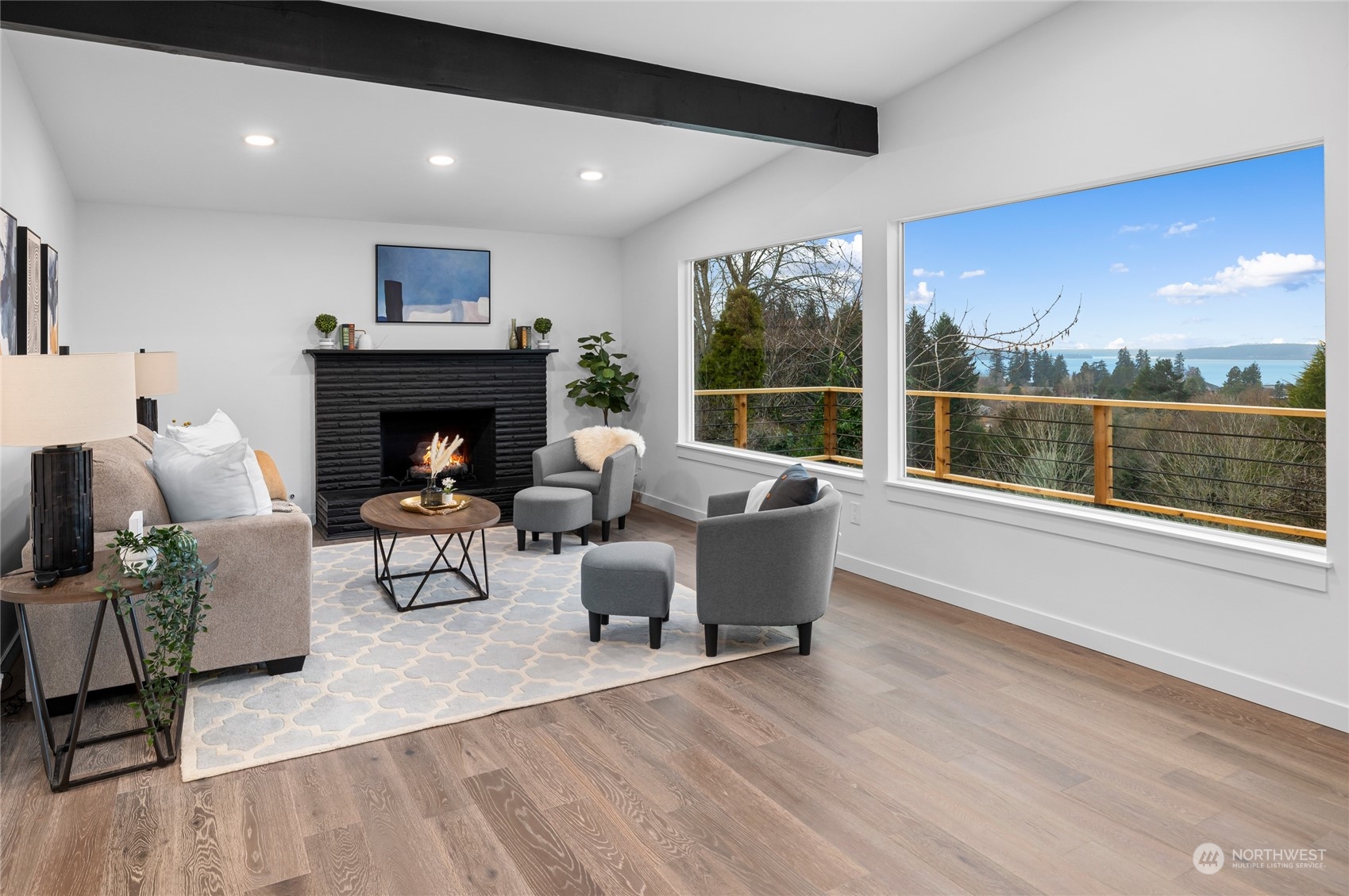 815 Rowell Street Steilacoom, WA 98388 - Photo 8 of 34 a living room with furniture and a fireplace