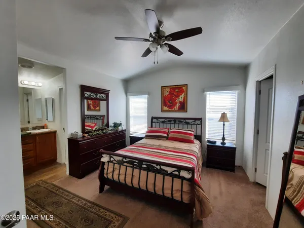 a living room with a couch and a dresser
