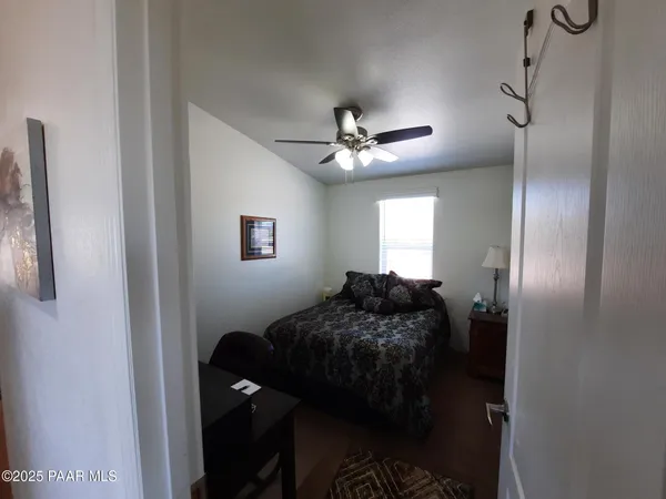 a kitchen with stainless steel appliances granite countertop a refrigerator and a stove