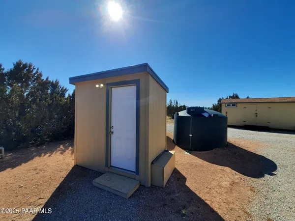 a room with furniture and wooden floor