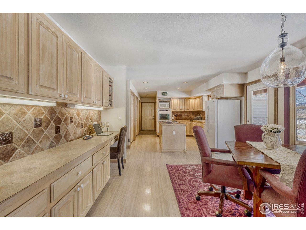 3617 Glade Road Loveland, CO 80538 - Photo 15 of 50 Dining Nook with Built-In Work Space