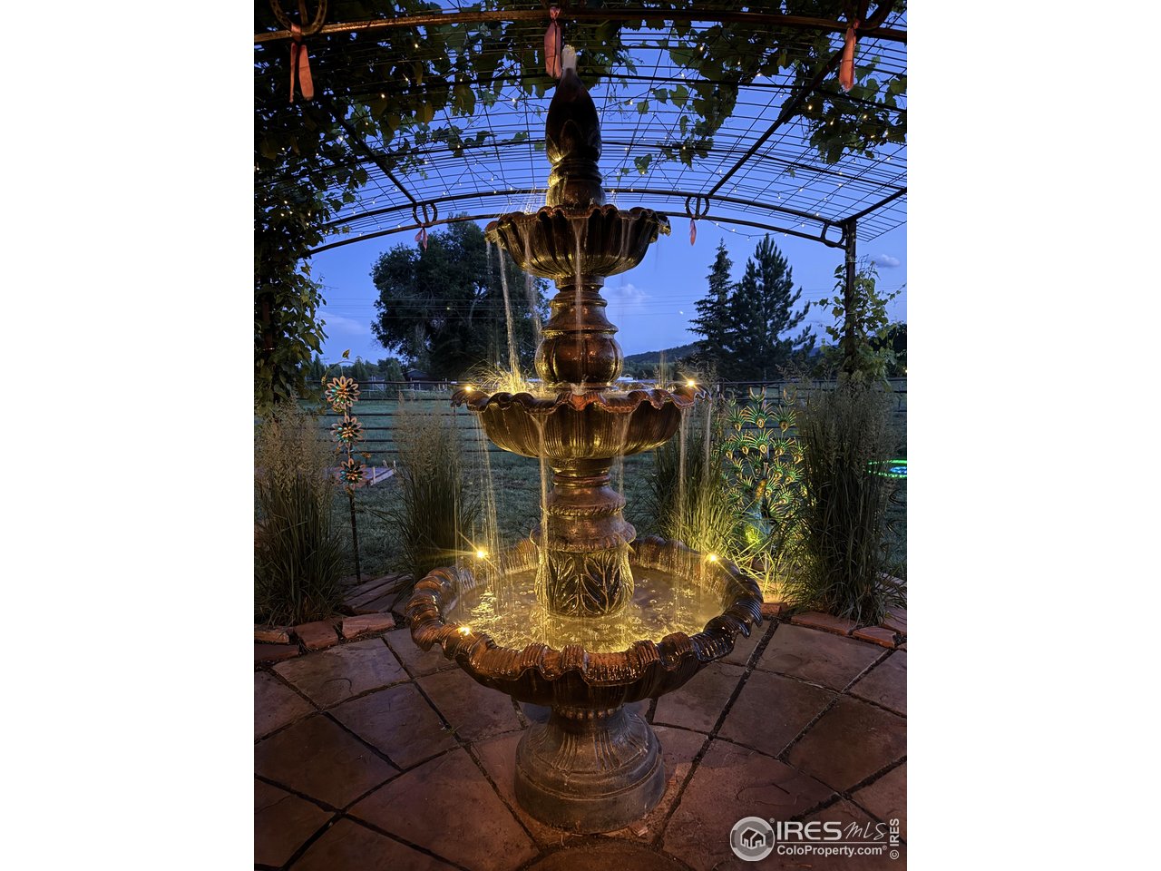3617 Glade Road Loveland, CO 80538 - Photo 36 of 50 Beautifully Lit Fountain!
