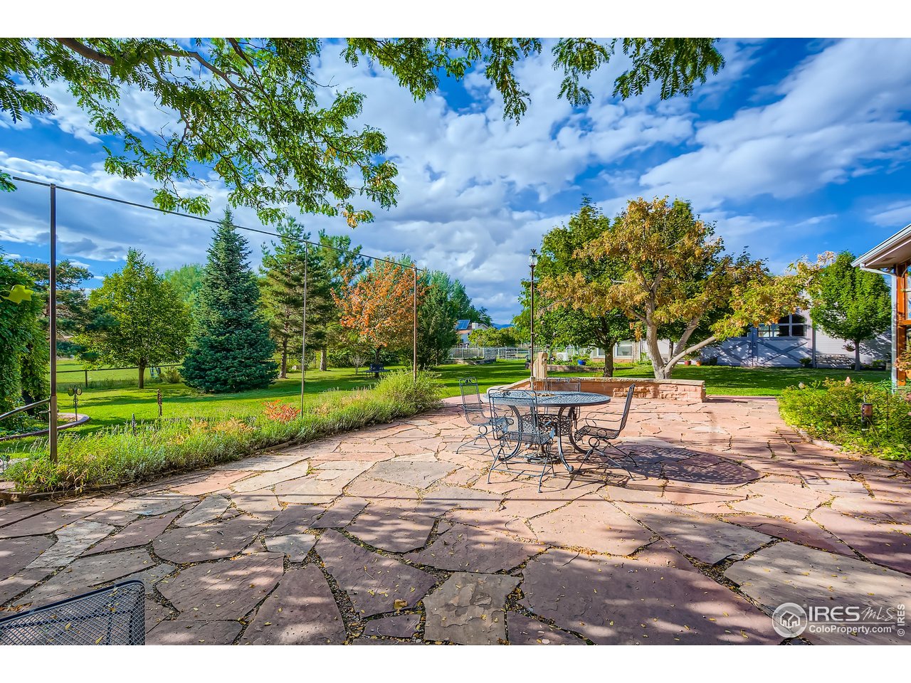 3617 Glade Road Loveland, CO 80538 - Photo 40 of 50 Flagstone patio out the back of the home