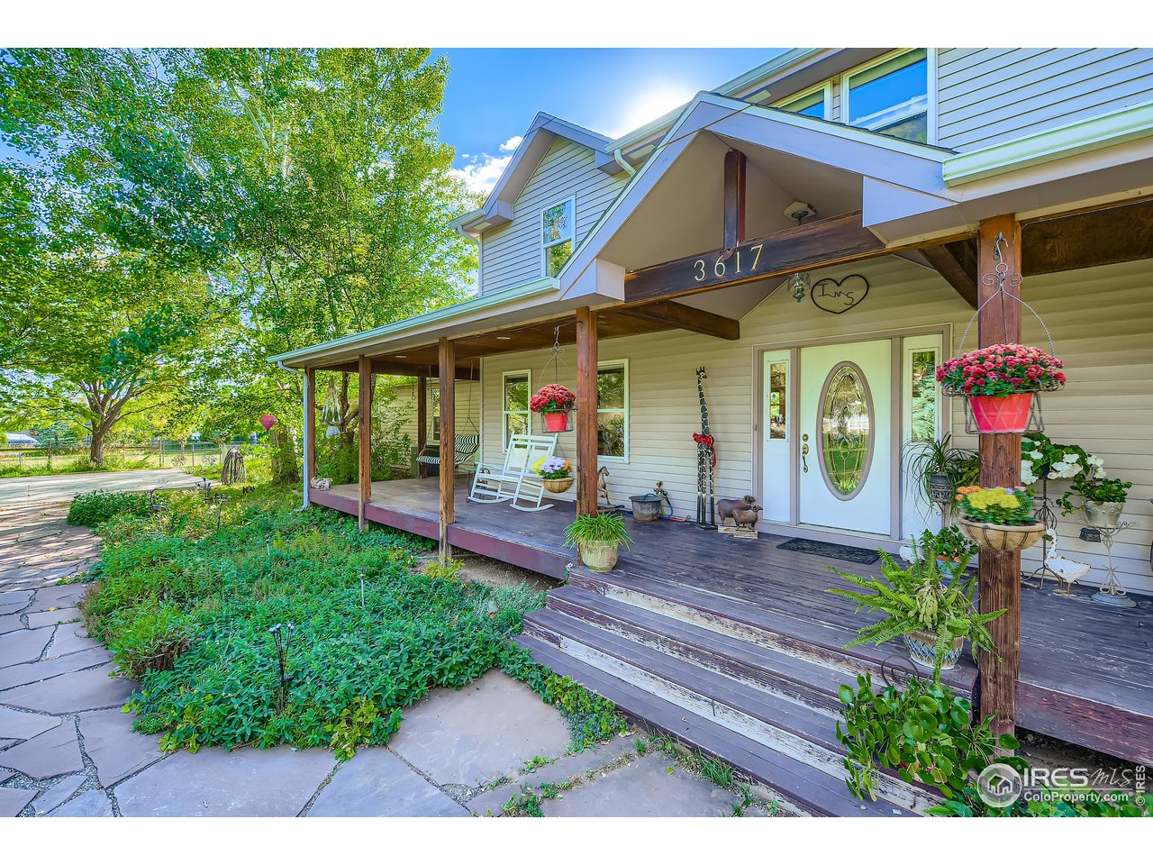 3617 Glade Road Loveland, CO 80538 - Photo 4 of 50 Awesome flagstone path to covered porch entry