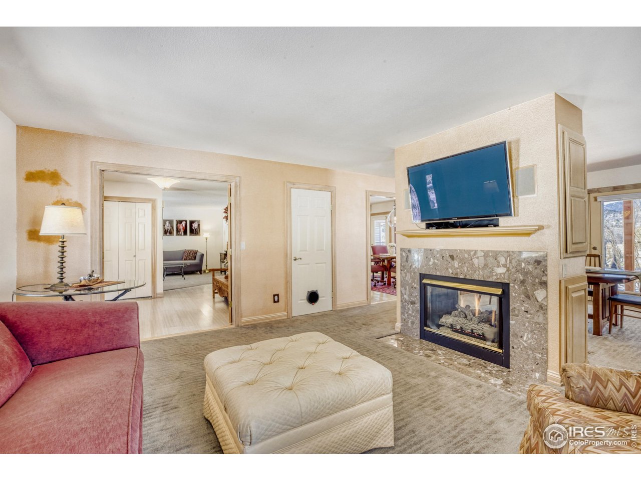 3617 Glade Road Loveland, CO 80538 - Photo 8 of 50 Two sided fireplace in Family Room
