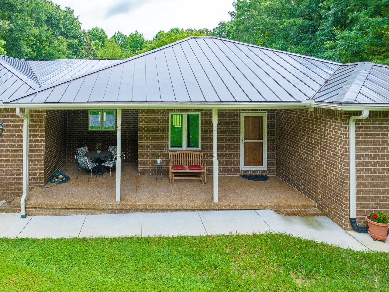41 Arnold Road Flintville, TN 37335 - Photo 2 of 41 a view of small house with backyard