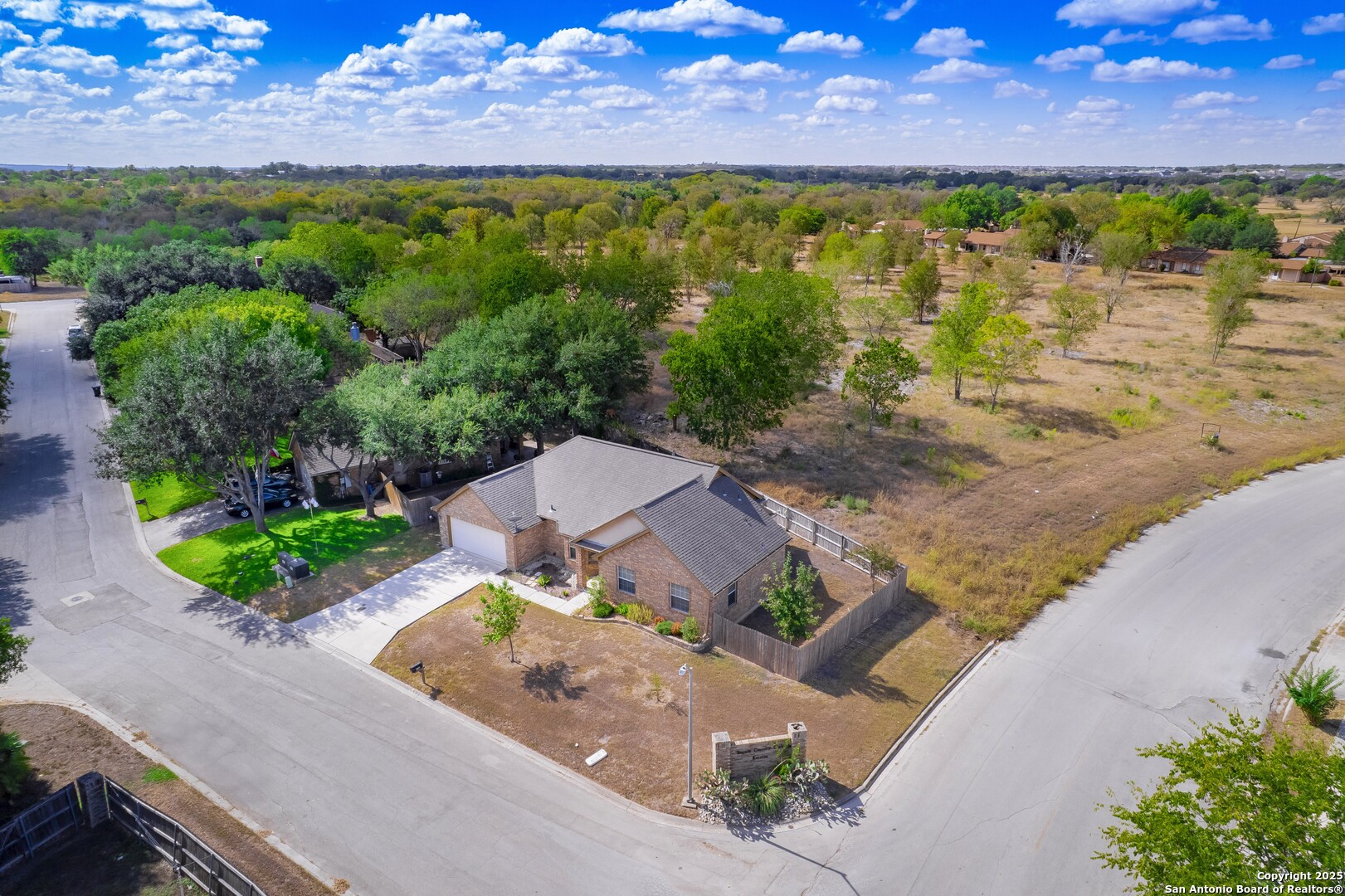 206 Club View West Seguin, TX 78155 - Photo 2 of 36 an aerial view of a house with a garden
